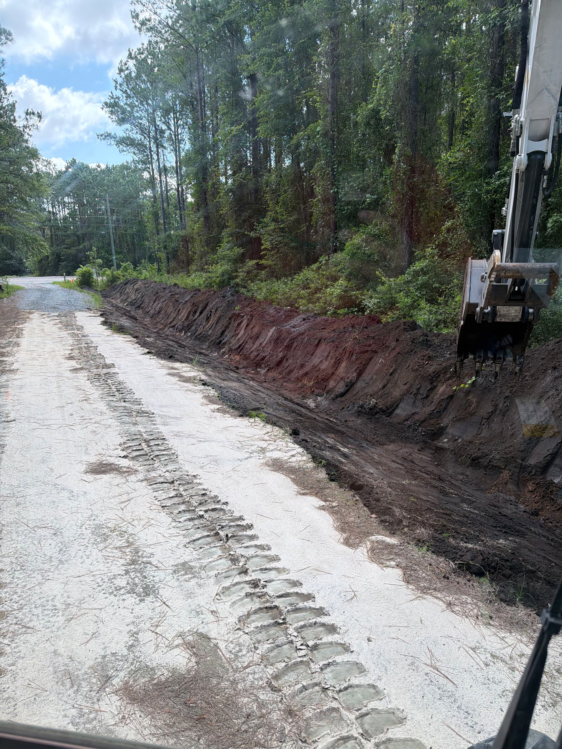 Drainage Ditch Excavation Protecting Driveways in Richmond Hill image