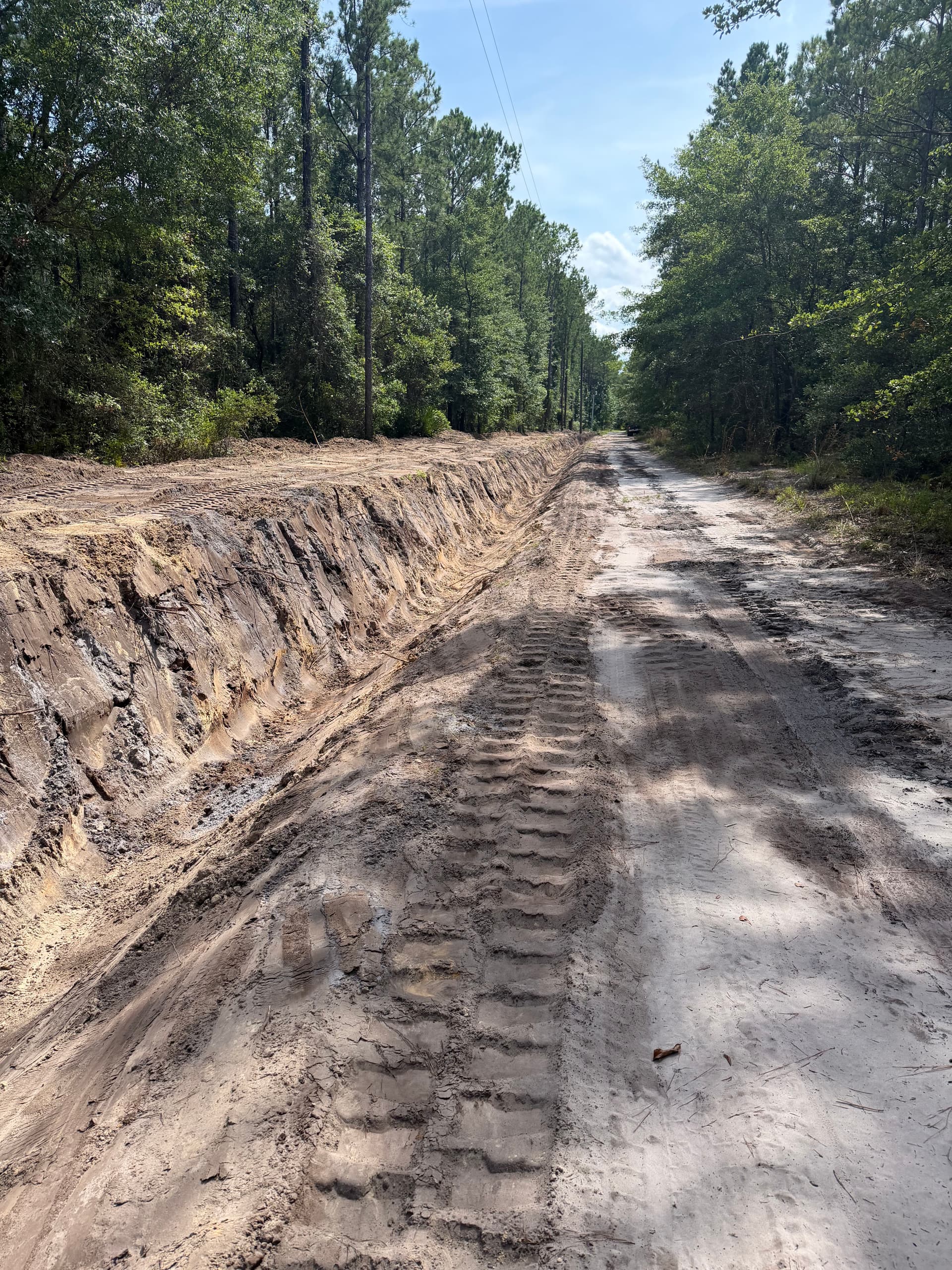 Gallery photos for Ditch Work Keeping Roads and Properties Draining Right in Richmond Hill: Image #1