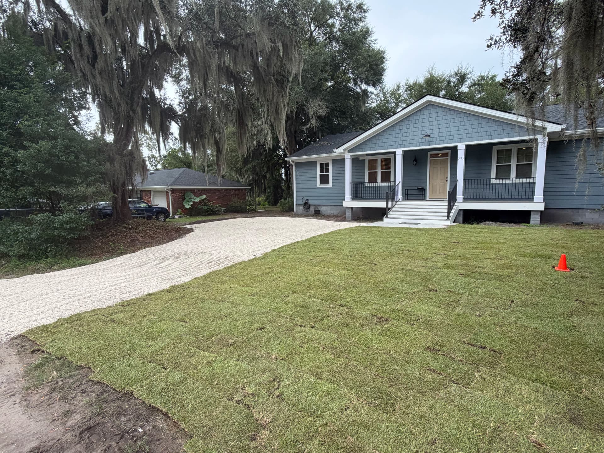 Fresh Sod and Gravel Driveway Give This Home a Clean Finish image